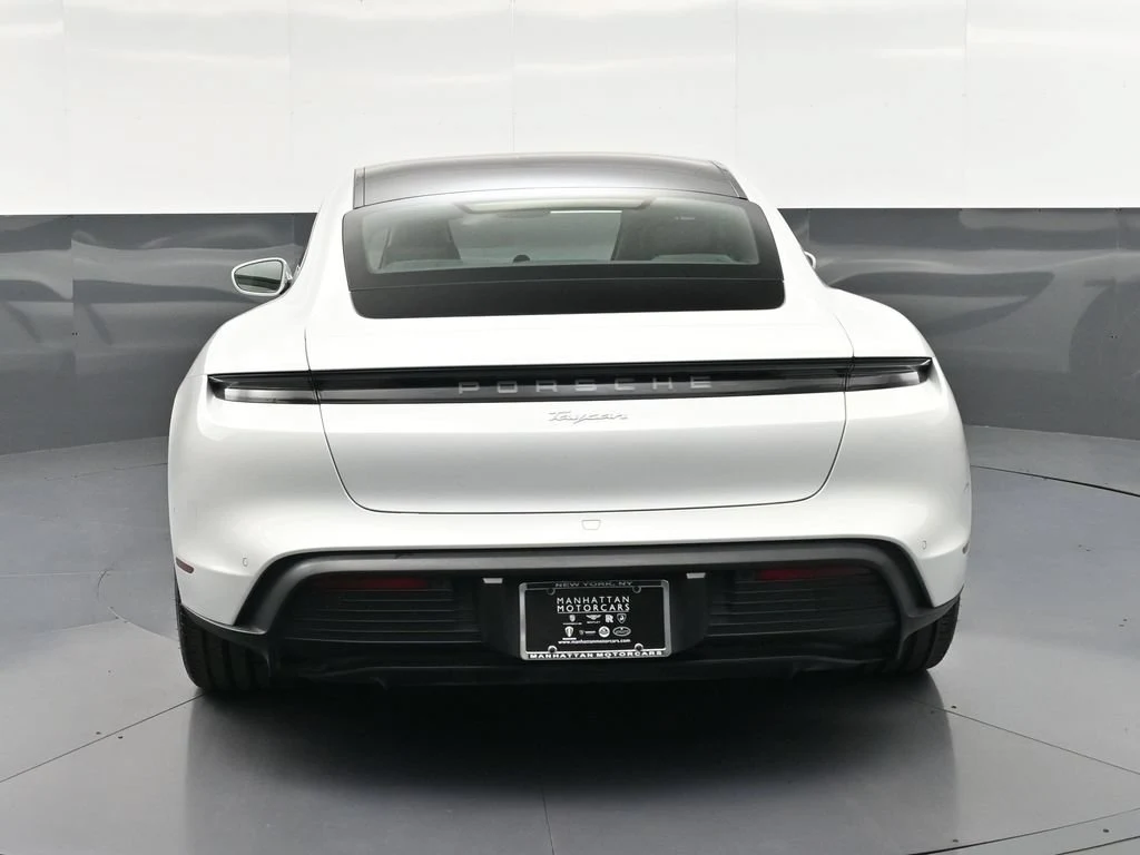 2024 Porsche Taycan, rear three-quarter view, White