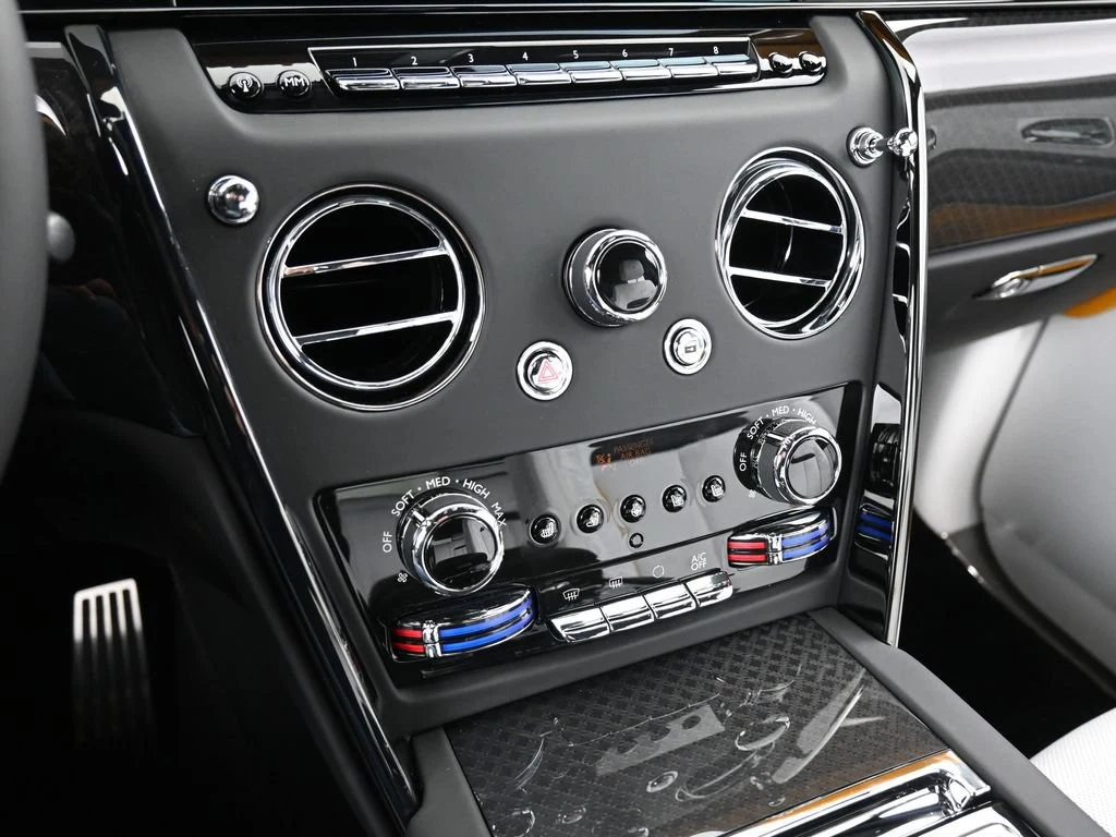 2026 Rolls-Royce Black Badge Cullinan Series II interior, center console, Arctic White and Black