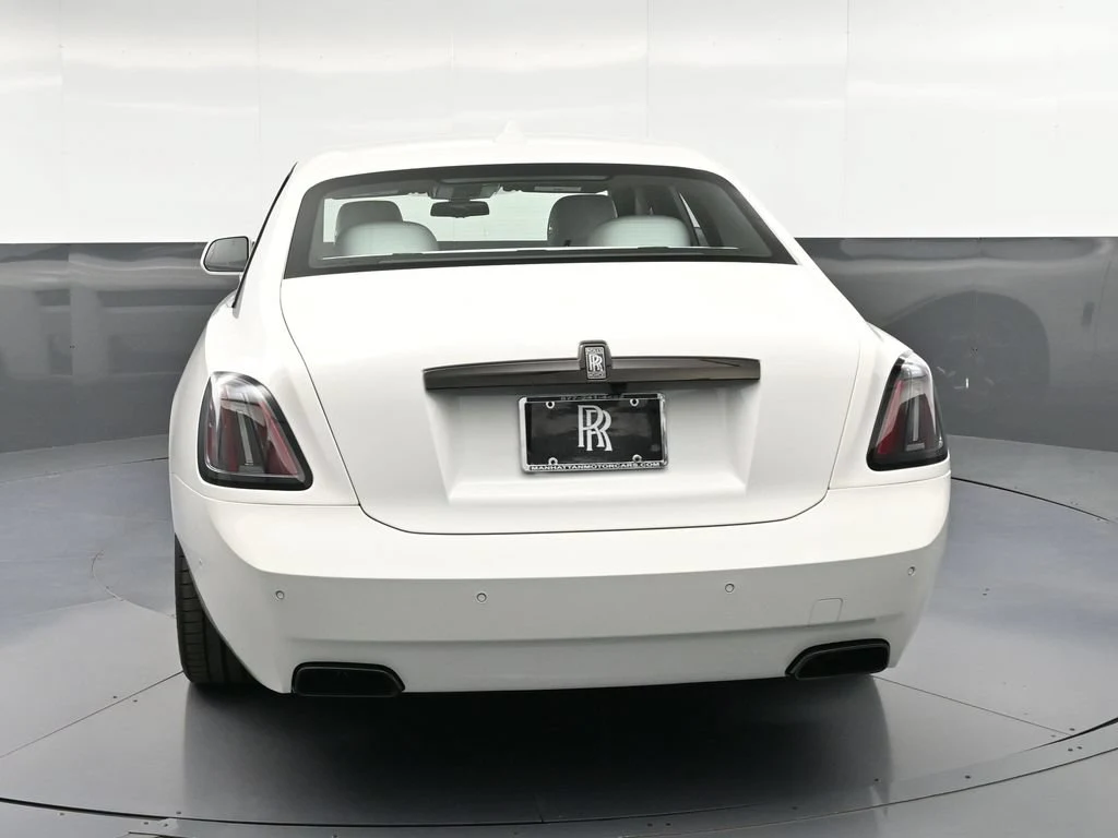 2027 Rolls-Royce Black Badge Ghost Series II, rear three-quarter view, White