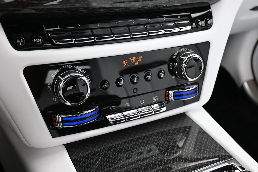 2027 Rolls-Royce Black Badge Ghost Series II interior, center console, Artic White