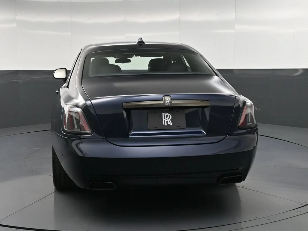 2027 Rolls-Royce Black Badge Ghost Series II, rear three-quarter view, Blue