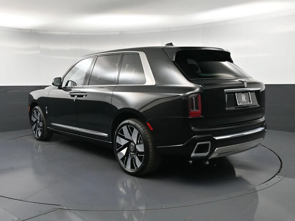 2027 Rolls-Royce Cullinan Series II, rear three-quarter view, Black