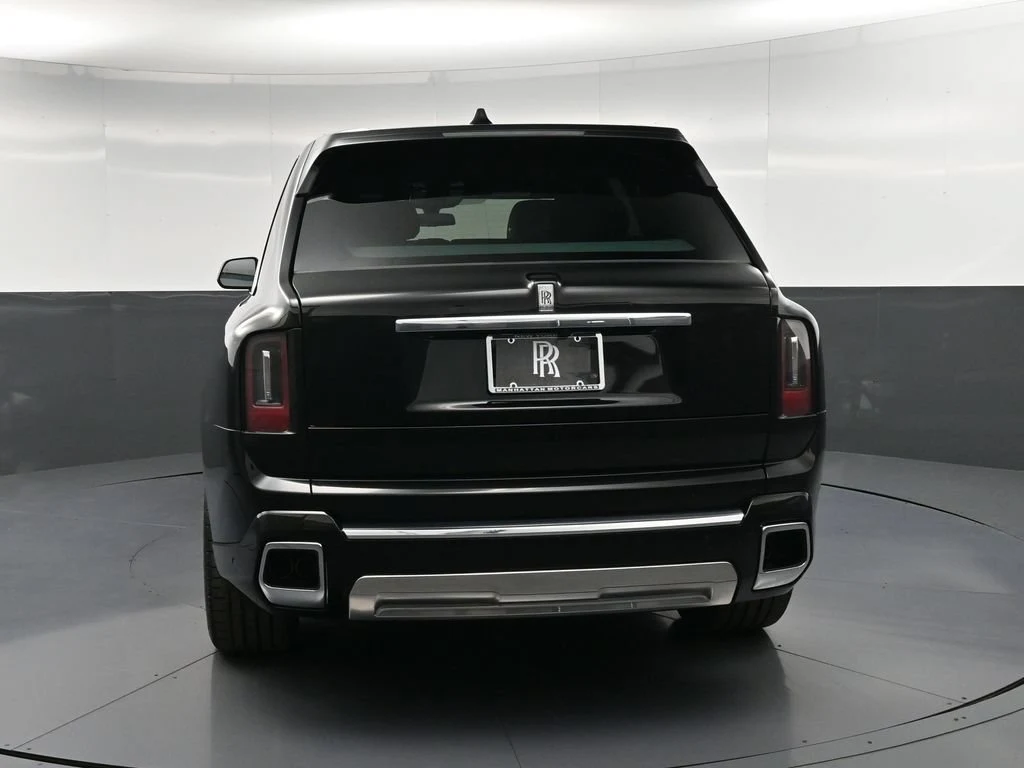 2027 Rolls-Royce Cullinan Series II, rear three-quarter view, Black