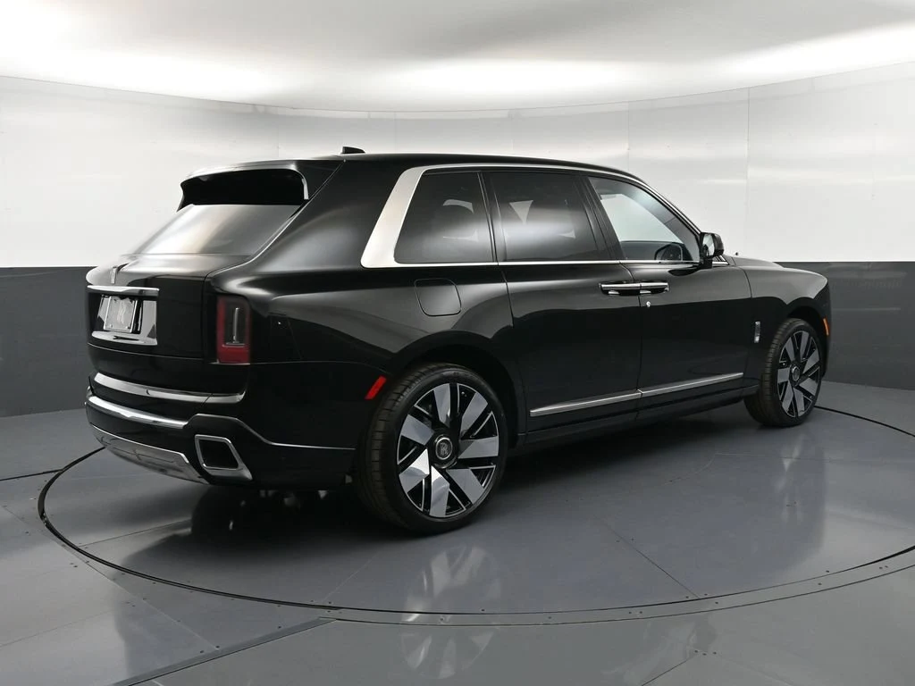 2027 Rolls-Royce Cullinan Series II, rear three-quarter view, Black