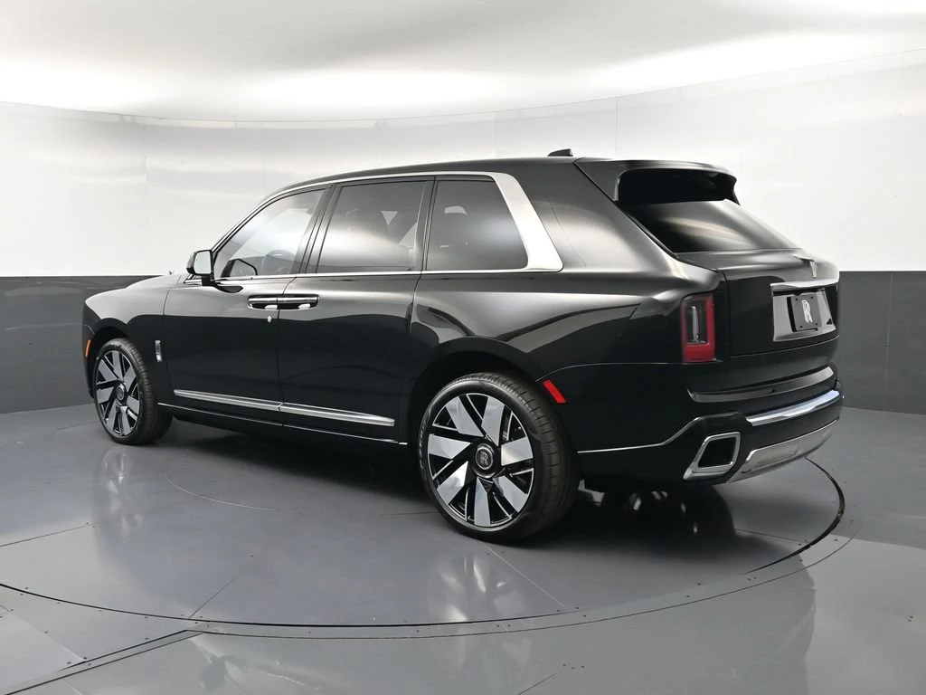 2027 Rolls-Royce Cullinan Series II, rear three-quarter view, Black