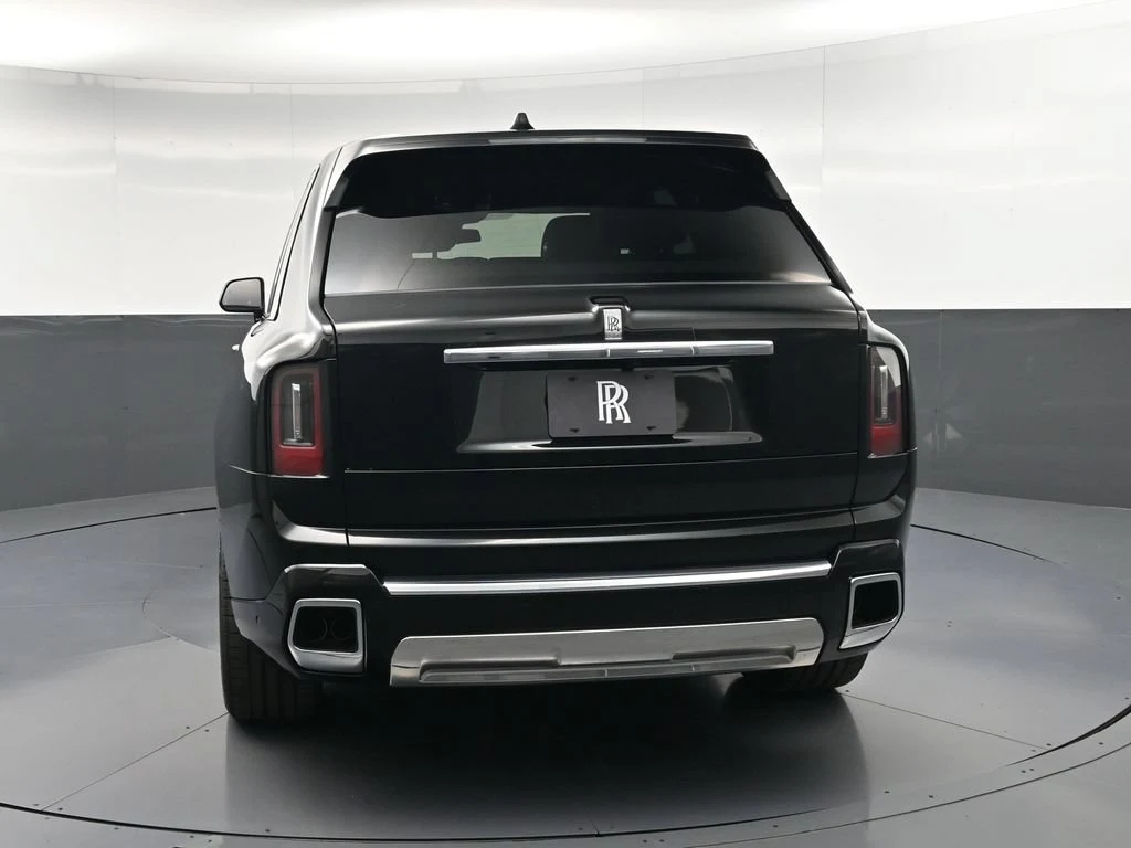 2027 Rolls-Royce Cullinan Series II, rear three-quarter view, Black