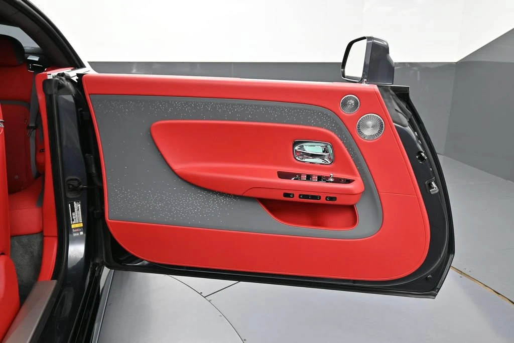 2024 Rolls-Royce Spectre interior, door panel, Phoenix Red and Scivaro Grey