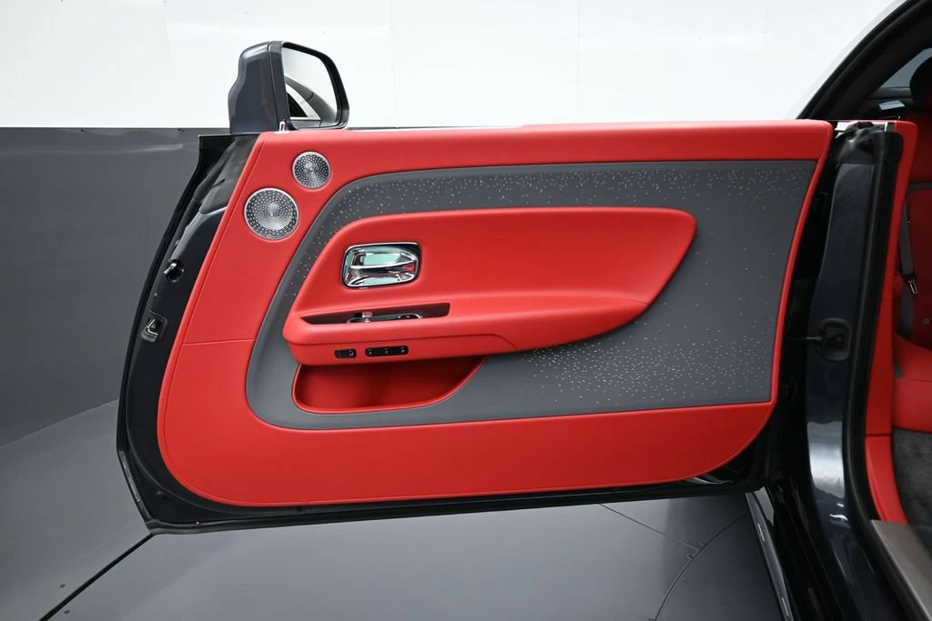 2024 Rolls-Royce Spectre interior, door panel, Phoenix Red and Scivaro Grey