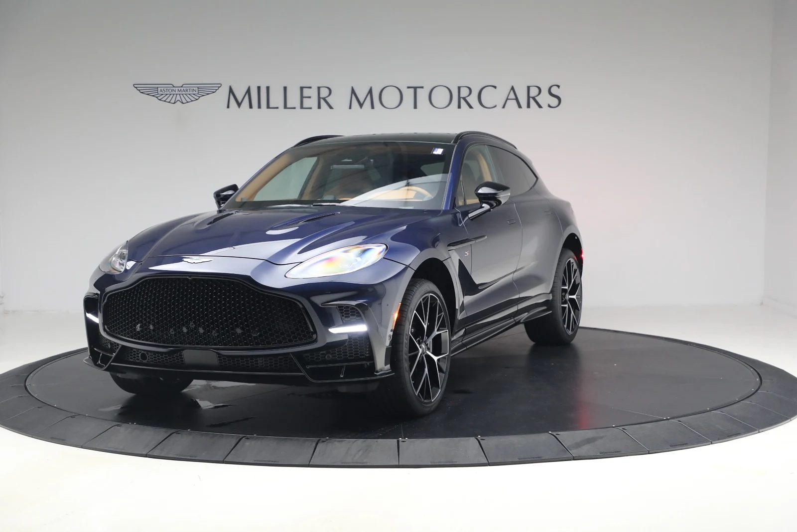 2026 Aston Martin DBX S, Midnight Blue, complete car from a front three-quarter angle