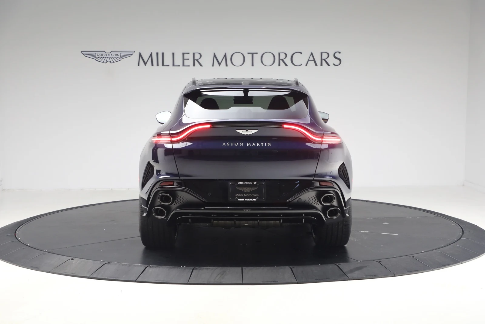 2026 Aston Martin DBX S, rear three-quarter view, Midnight Blue
