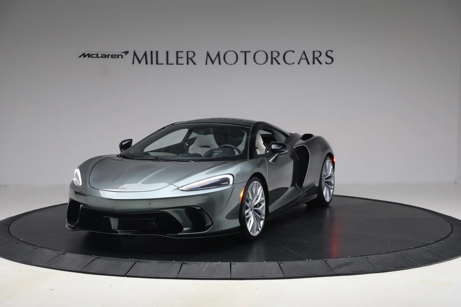 2027 McLaren GTS TechLux, Viridian, complete car from a front three-quarter angle