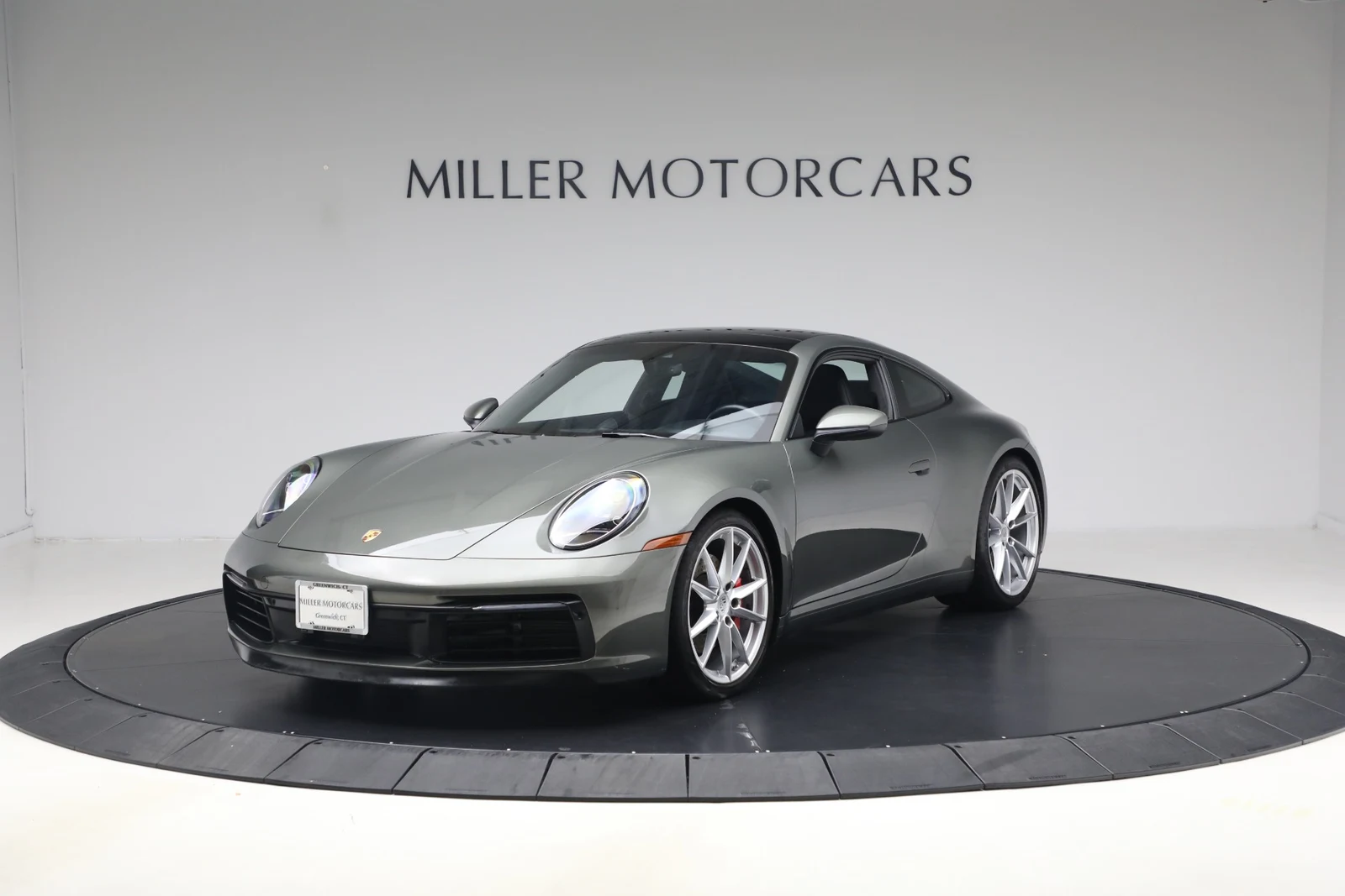 2020 Porsche 911 Carrera 4S, Aventurine Green Metallic, complete car from a front three-quarter angle