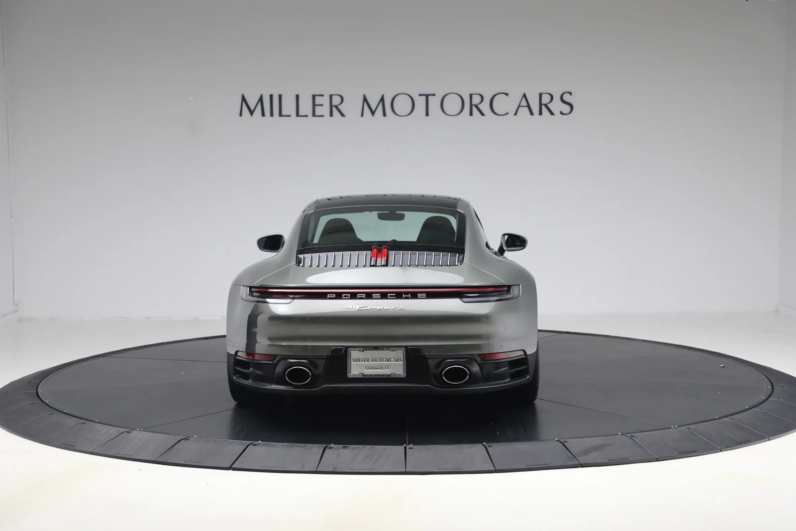 2020 Porsche 911 Carrera 4S, rear three-quarter view, Aventurine Green Metallic