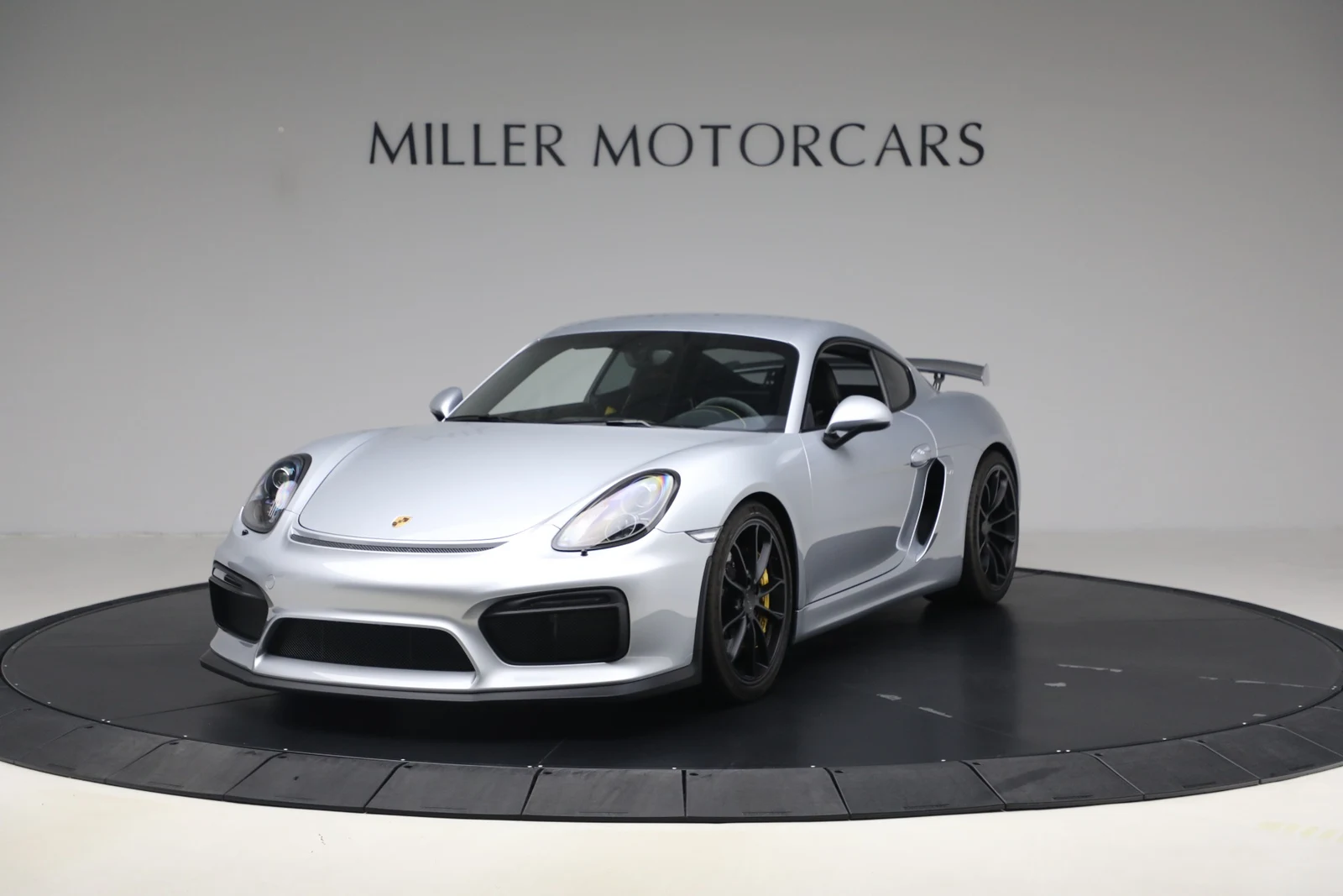2016 Porsche Cayman GT4, Rhodium Silver Metallic, complete car from a front three-quarter angle