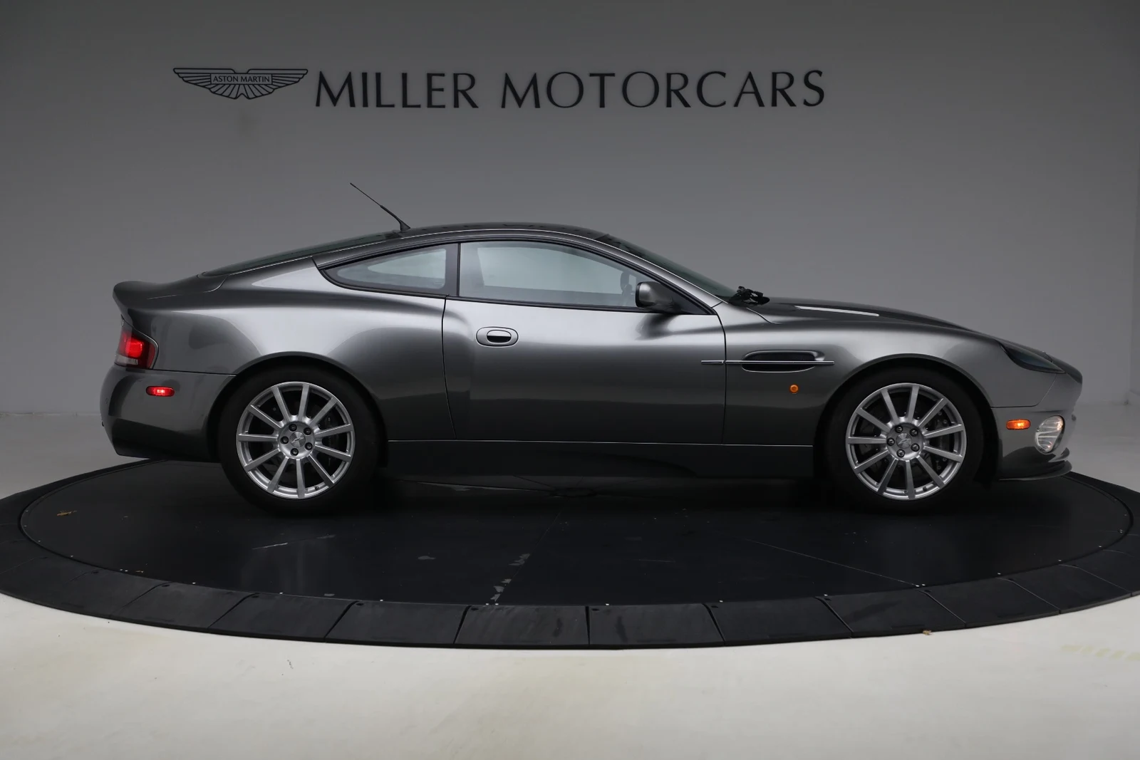 2006 Aston Martin V12 Vanquish S, side profile, Tungsten Silver