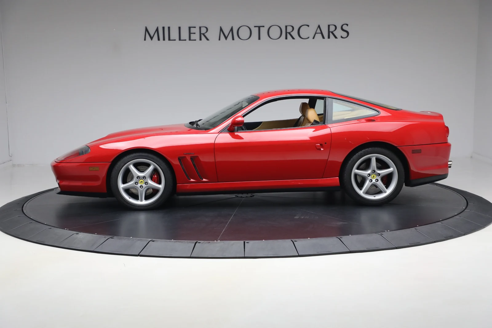 2000 Ferrari 550 Maranello, side profile, Rosso Corsa