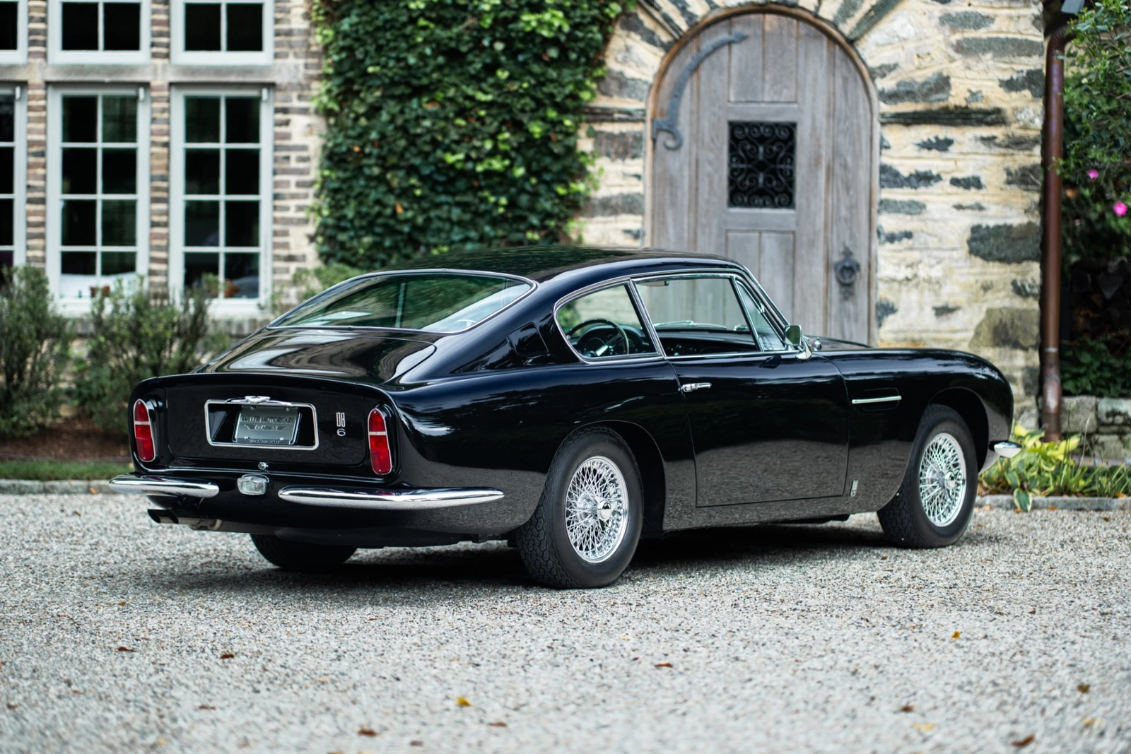 1968 Aston Martin DB6, rear three-quarter view, Black