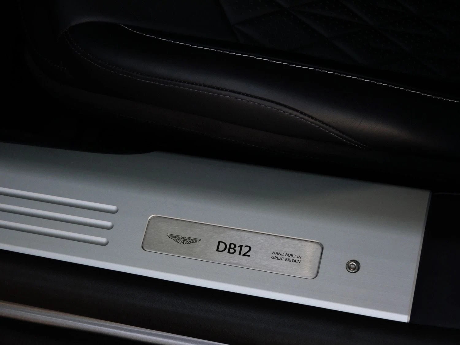 2024 Aston Martin DB12 interior, door sill, Onyx Black