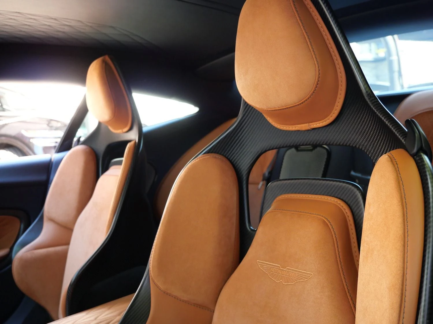 2024 Aston Martin DB12 interior, seats, Copper Tan Metallic