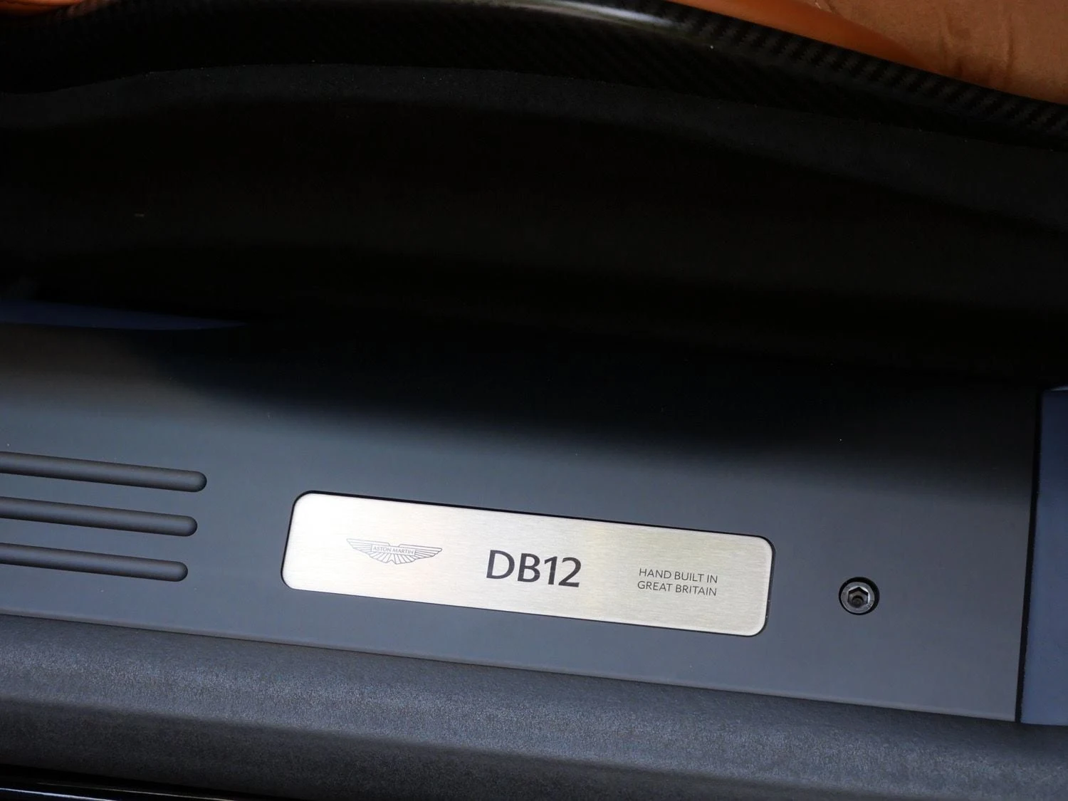 2024 Aston Martin DB12 interior, door sill, Copper Tan Metallic