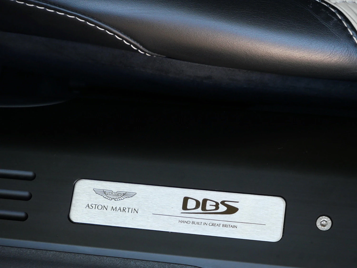 2021 Aston Martin DBS Superleggera interior, door sill, Obsidian Black