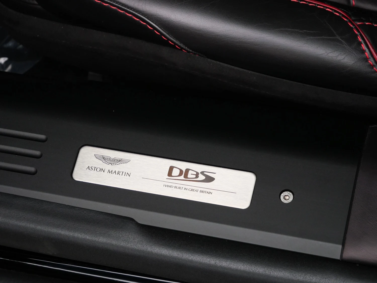 2023 Aston Martin DBS Volante interior, door sill, Metallic Black