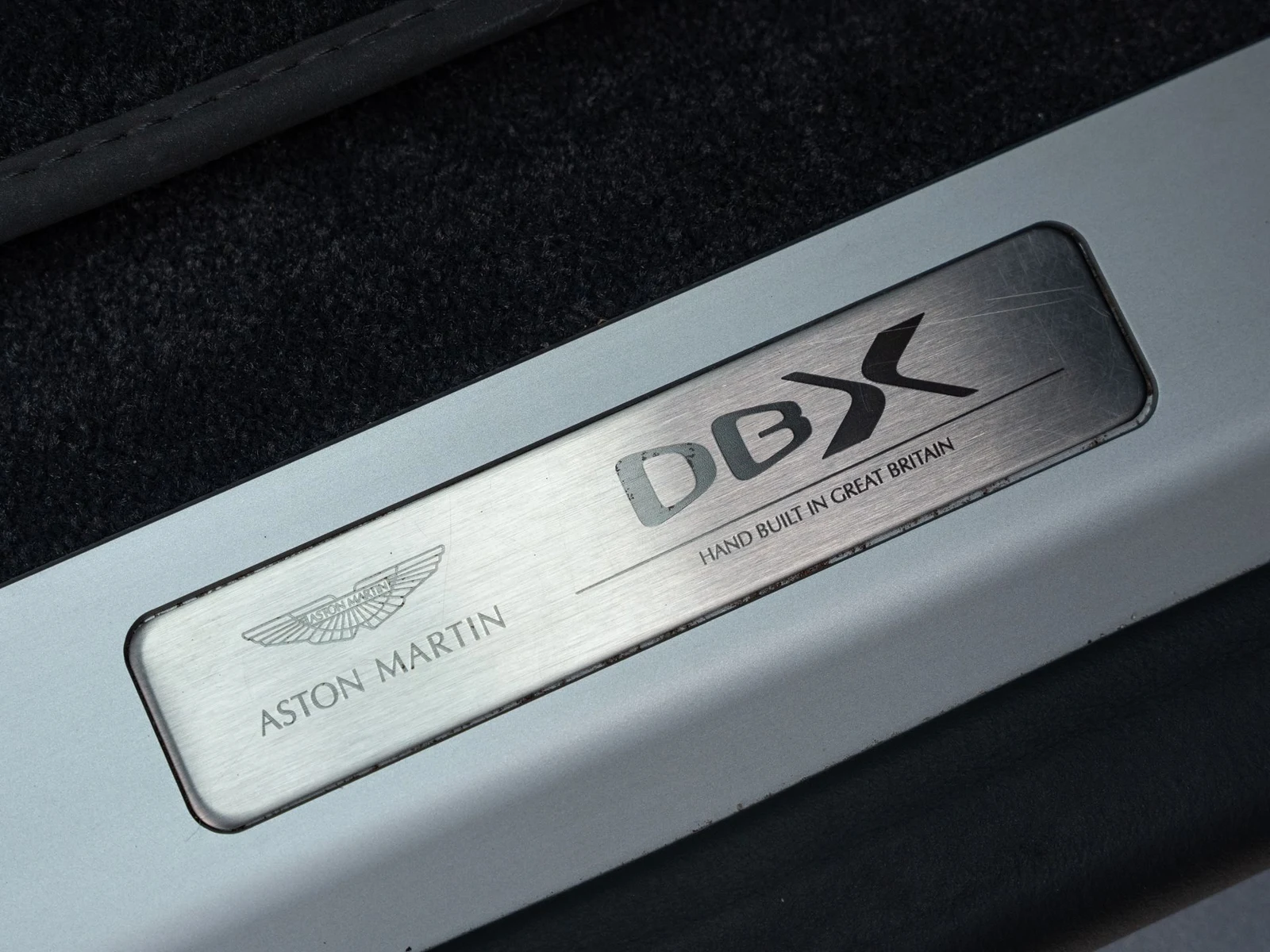 2023 Aston Martin DBX707 interior, door sill, Dark Knight