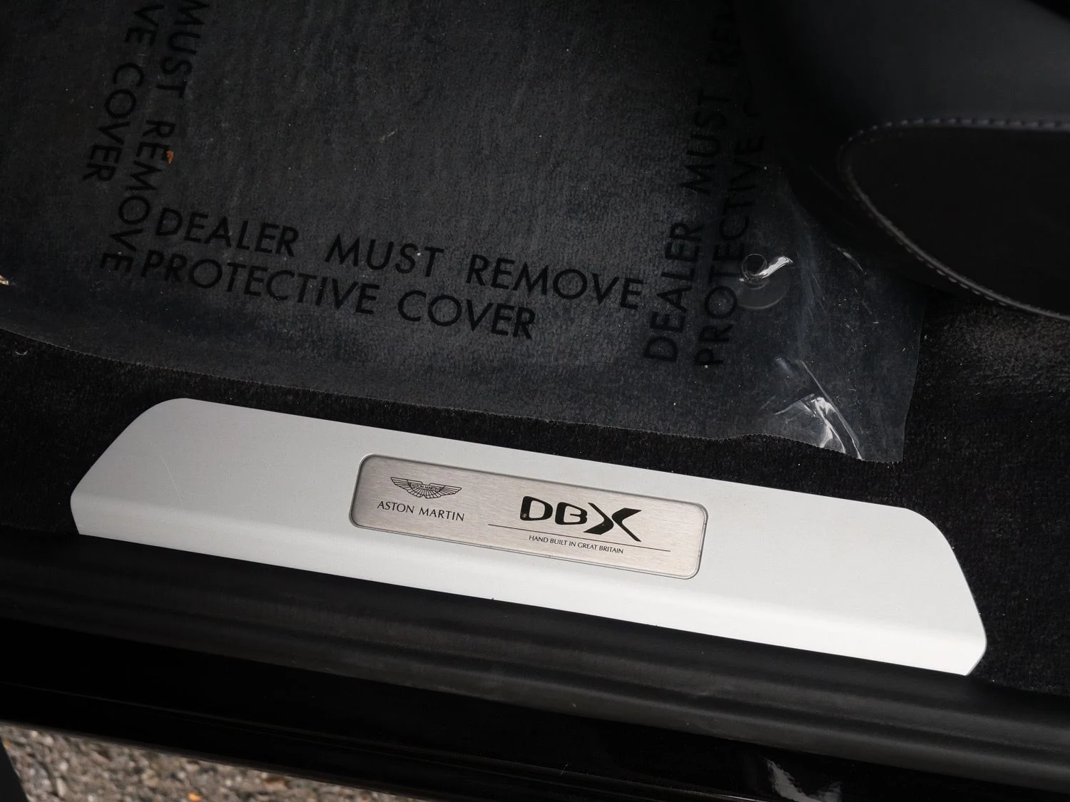 2024 Aston Martin DBX707 interior, door sill, Onyx Black