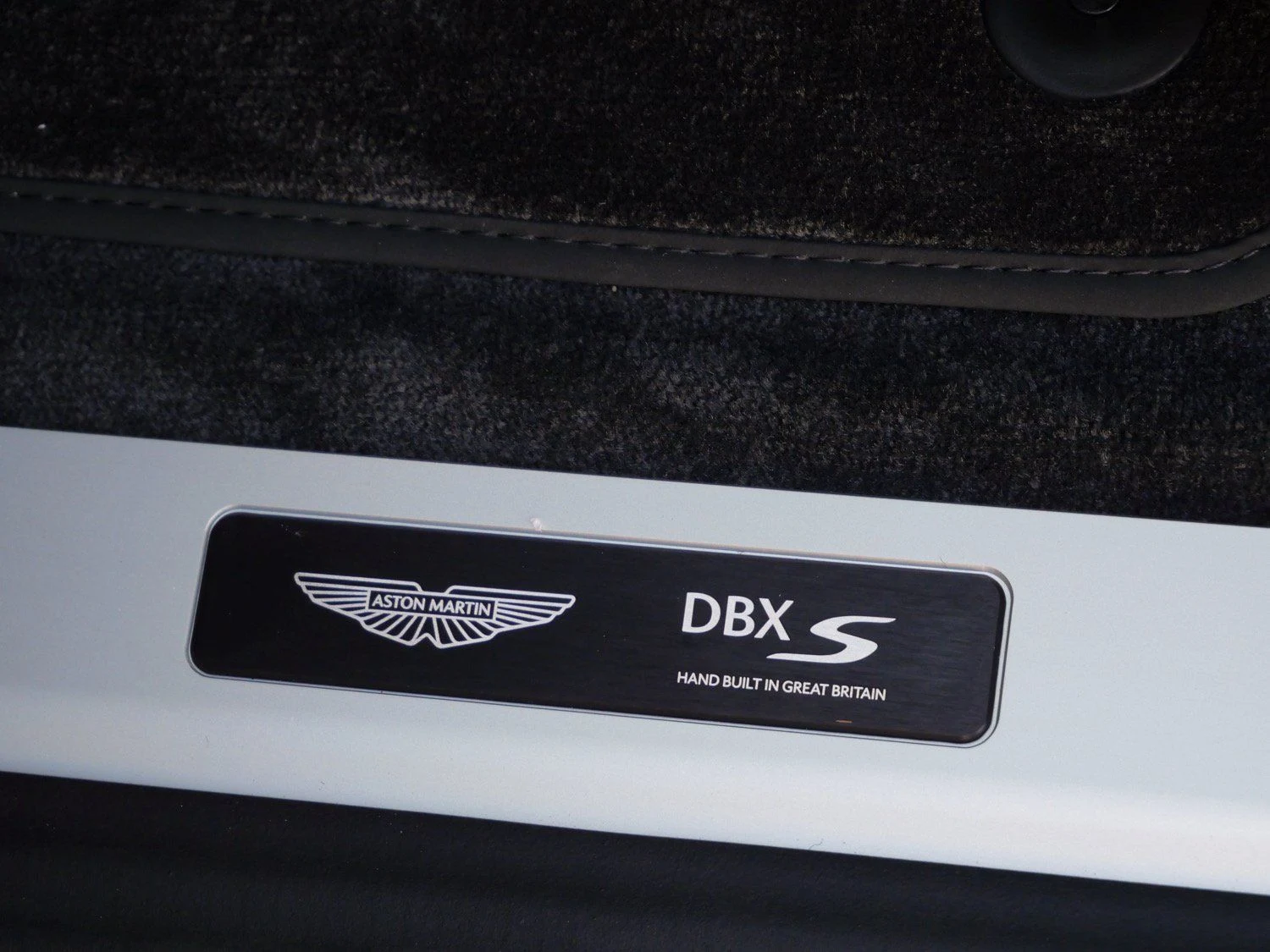 2026 Aston Martin DBX S interior, door sill, Onyx Black - Semi Anilin