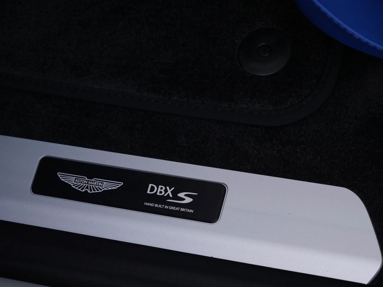 2026 Aston Martin DBX S interior, door sill, Cote D Azur Blue - Semi Aniline