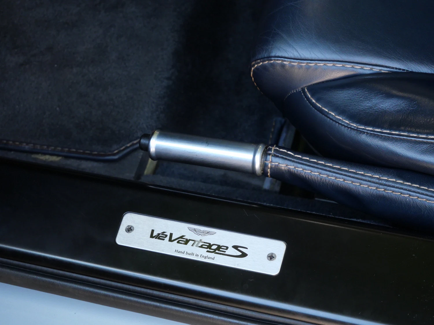 2015 Aston Martin V12 Vantage S Roadster interior, door sill, Dark Knight
