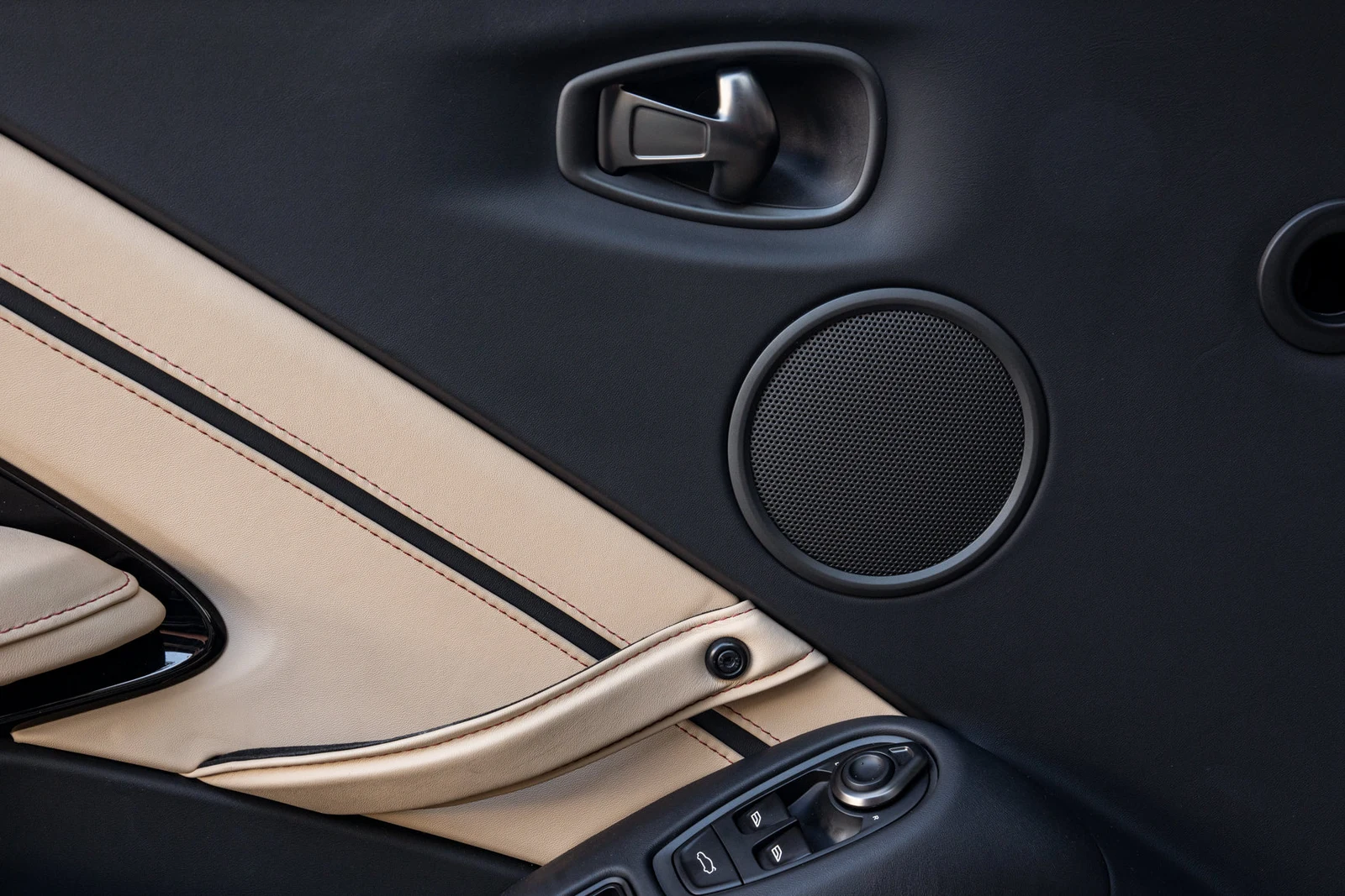2023 Aston Martin Vantage Roadster interior, door panel, Onyx Black/Sandstorm