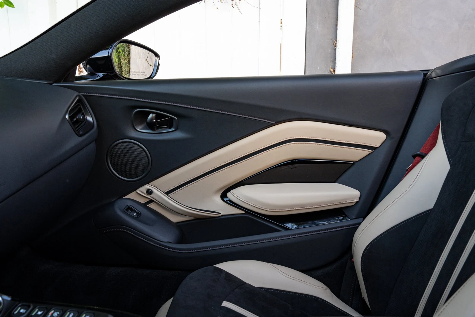 2023 Aston Martin Vantage Roadster interior, door panel, Onyx Black/Sandstorm