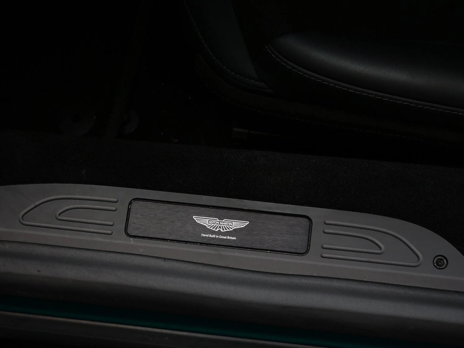 2025 Aston Martin Vantage interior, door sill, Onyx Black
