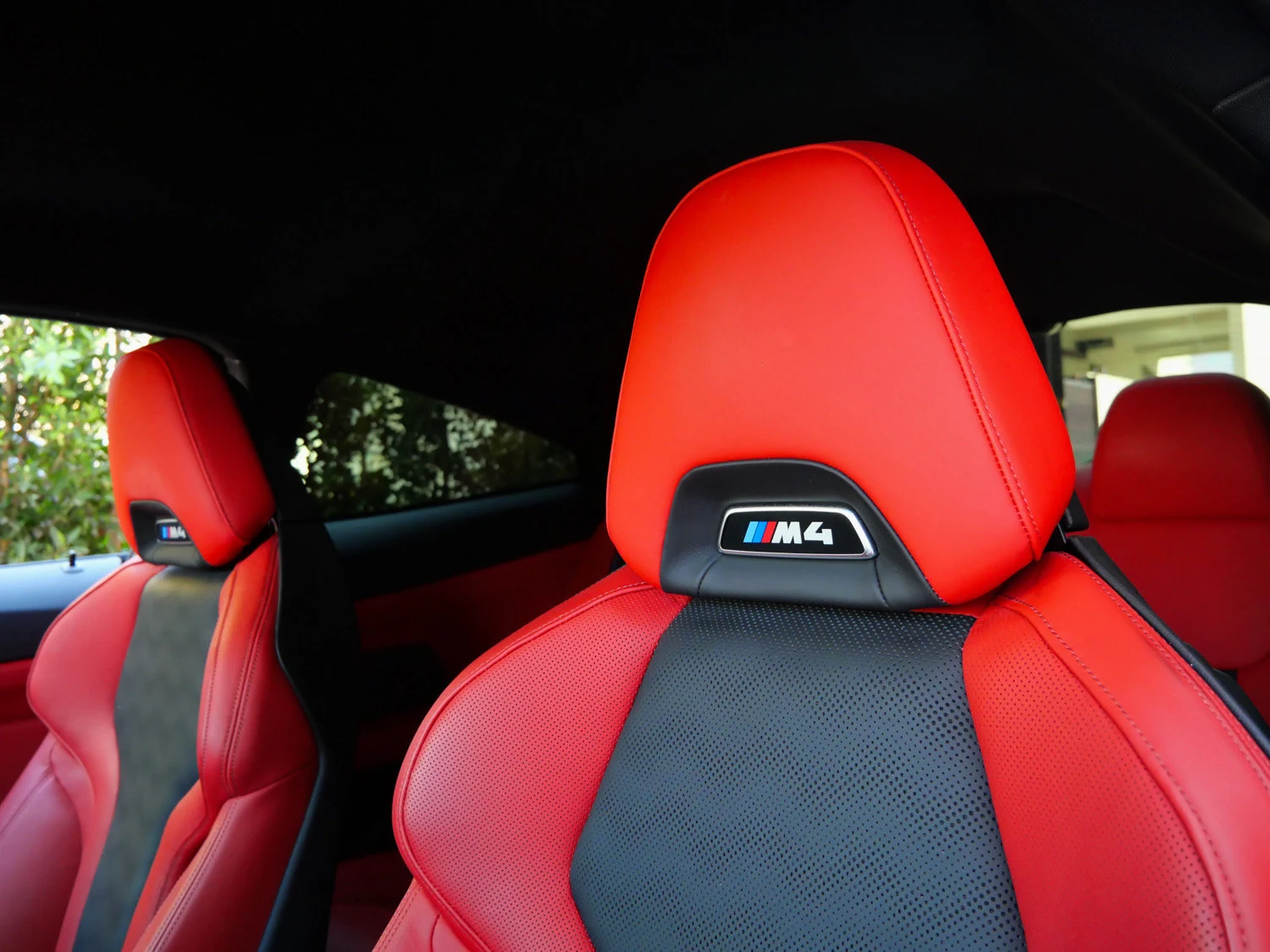 2021 BMW M4 Competition interior, seats, Fiona Red/Black