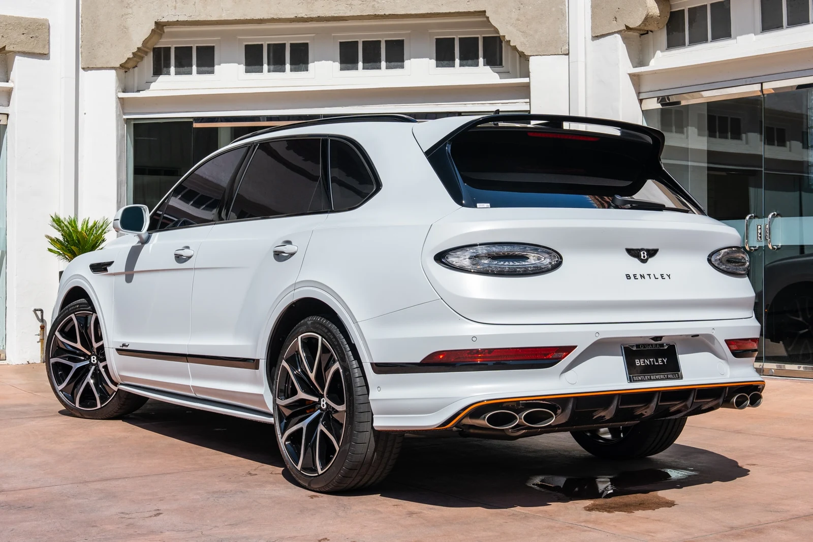 2026 Bentley Bentayga Speed, rear three-quarter view, White