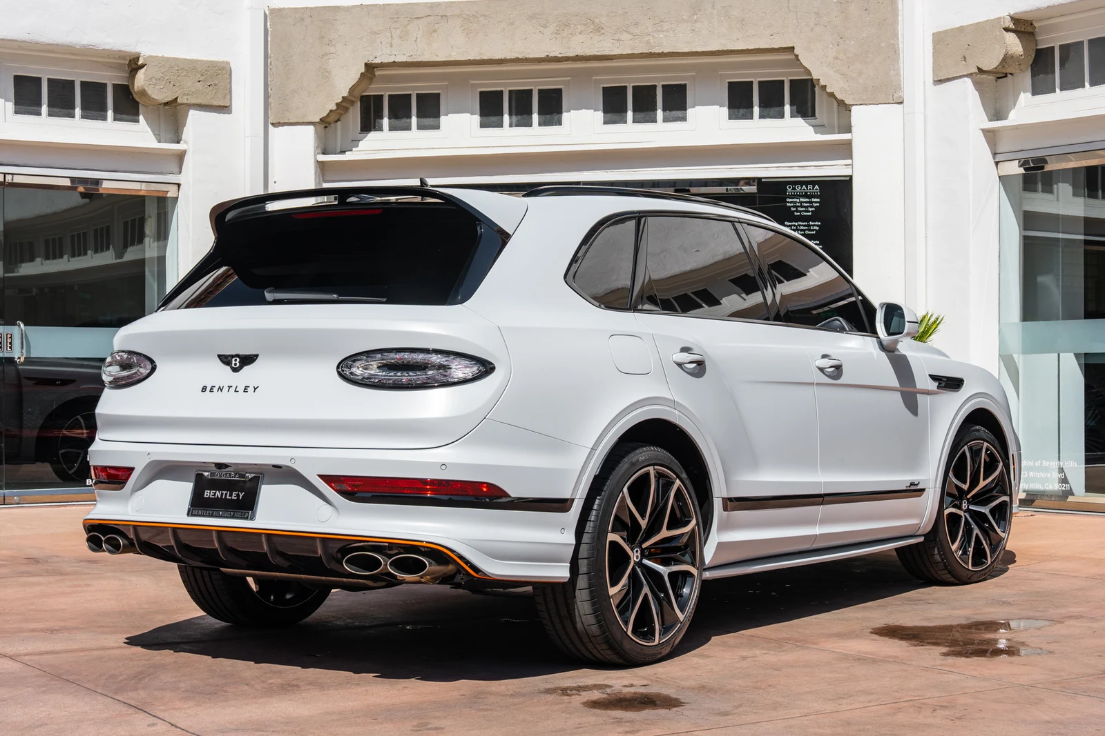 2026 Bentley Bentayga Speed, rear three-quarter view, White