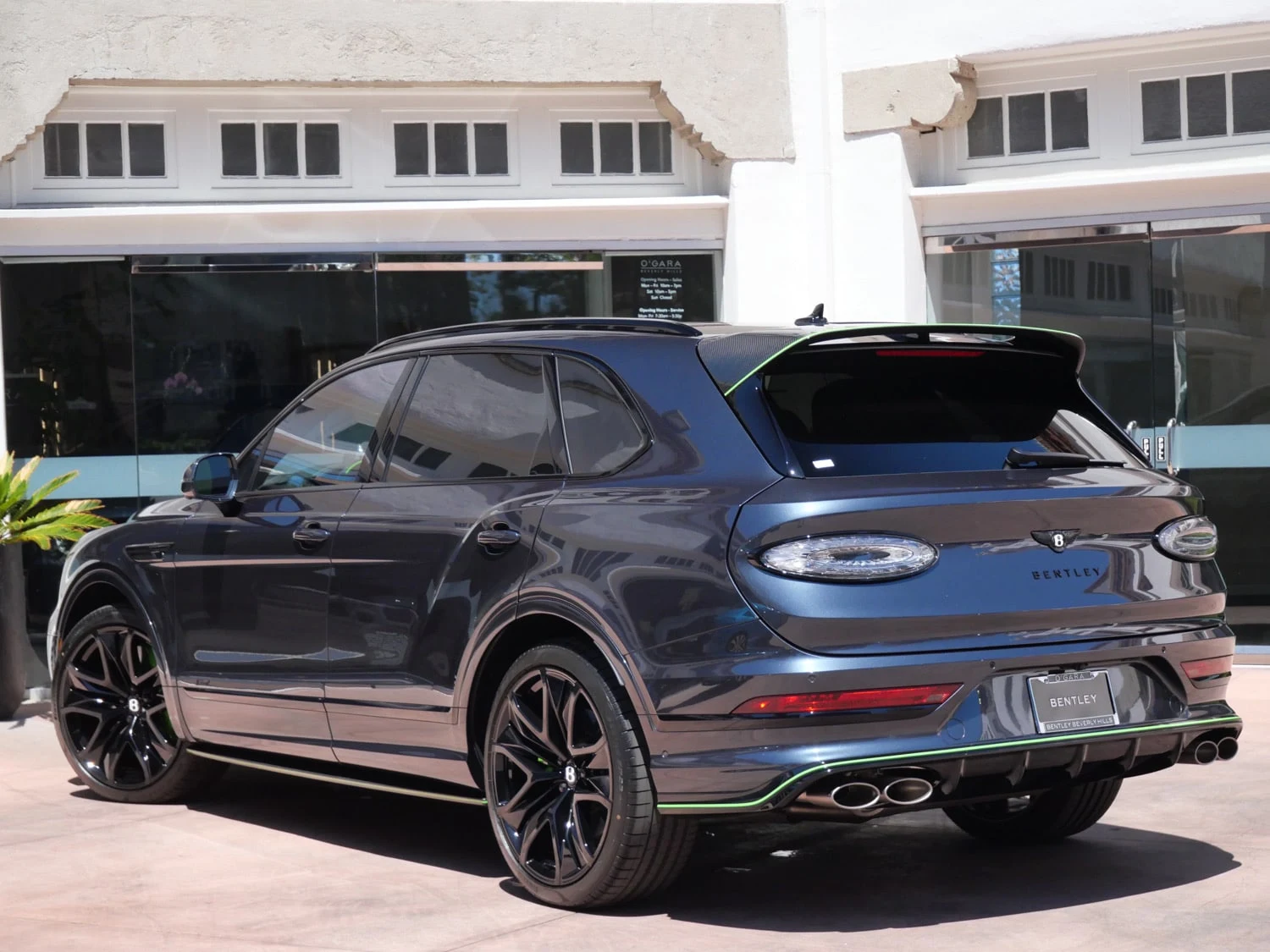 2026 Bentley Bentayga Speed, rear three-quarter view, Black