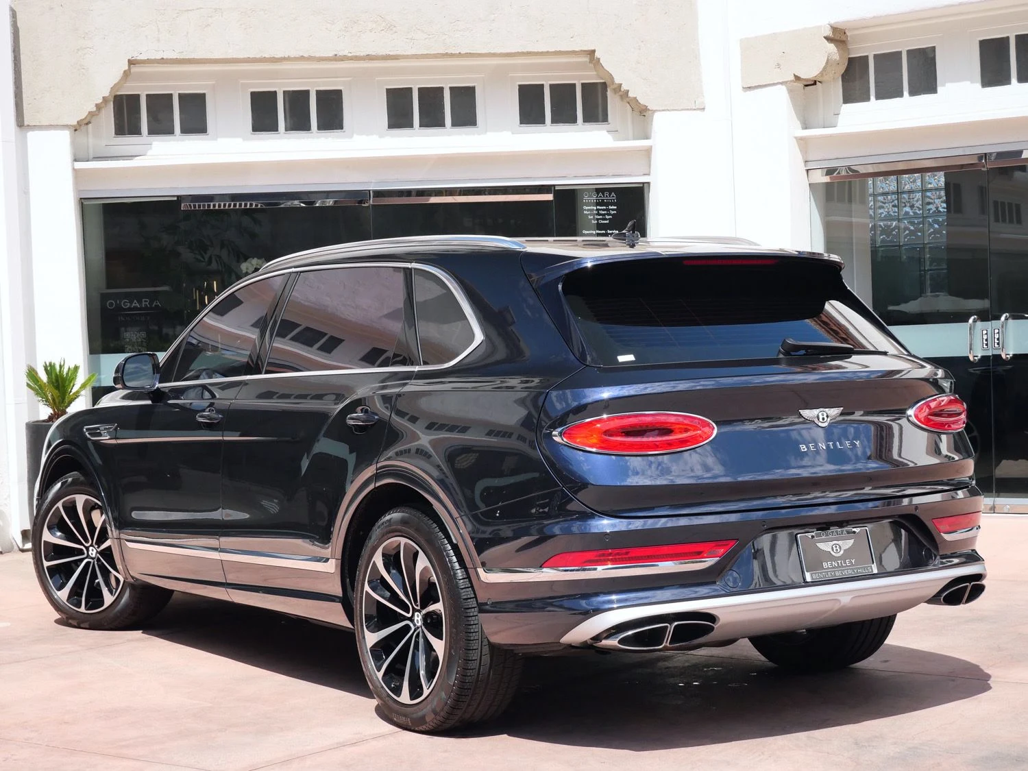 2023 Bentley Bentayga EWB, rear three-quarter view, Blue