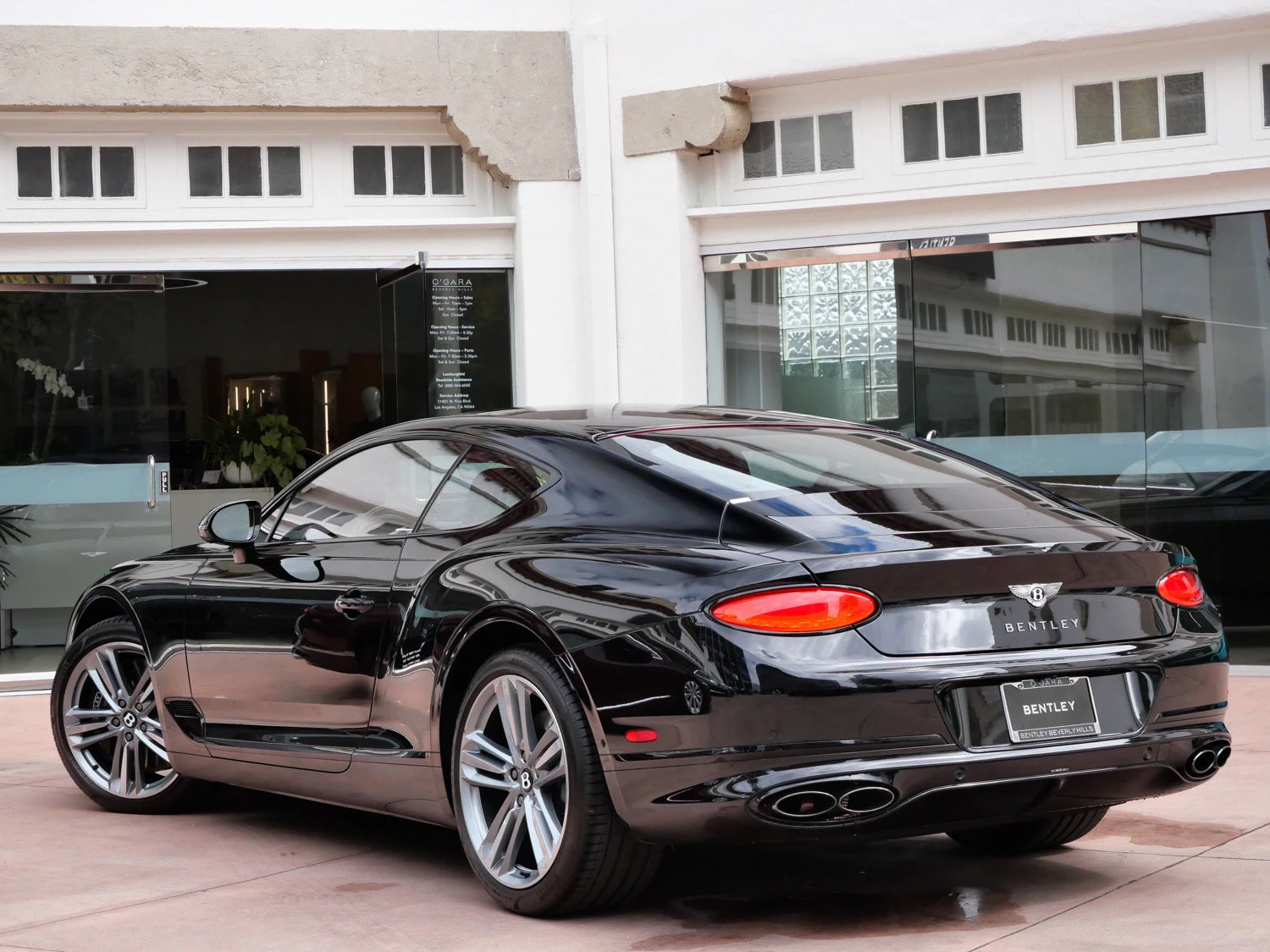 2024 Bentley Continental GT V8, rear three-quarter view, Black