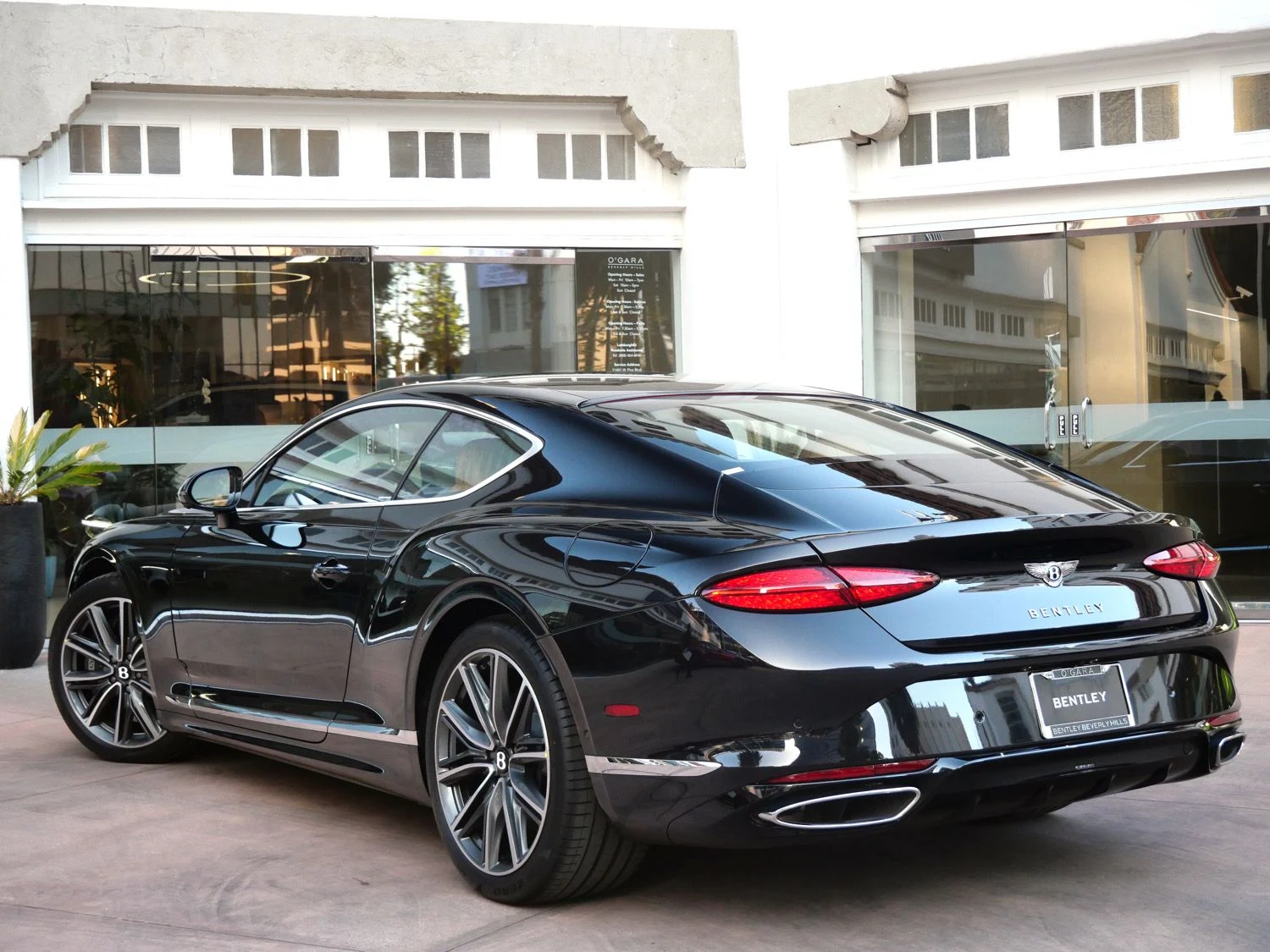 2026 Bentley Continental GT, rear three-quarter view, Black