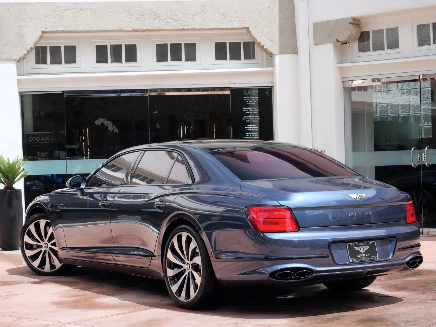 2023 Bentley Flying Spur Azure, rear three-quarter view, Grey