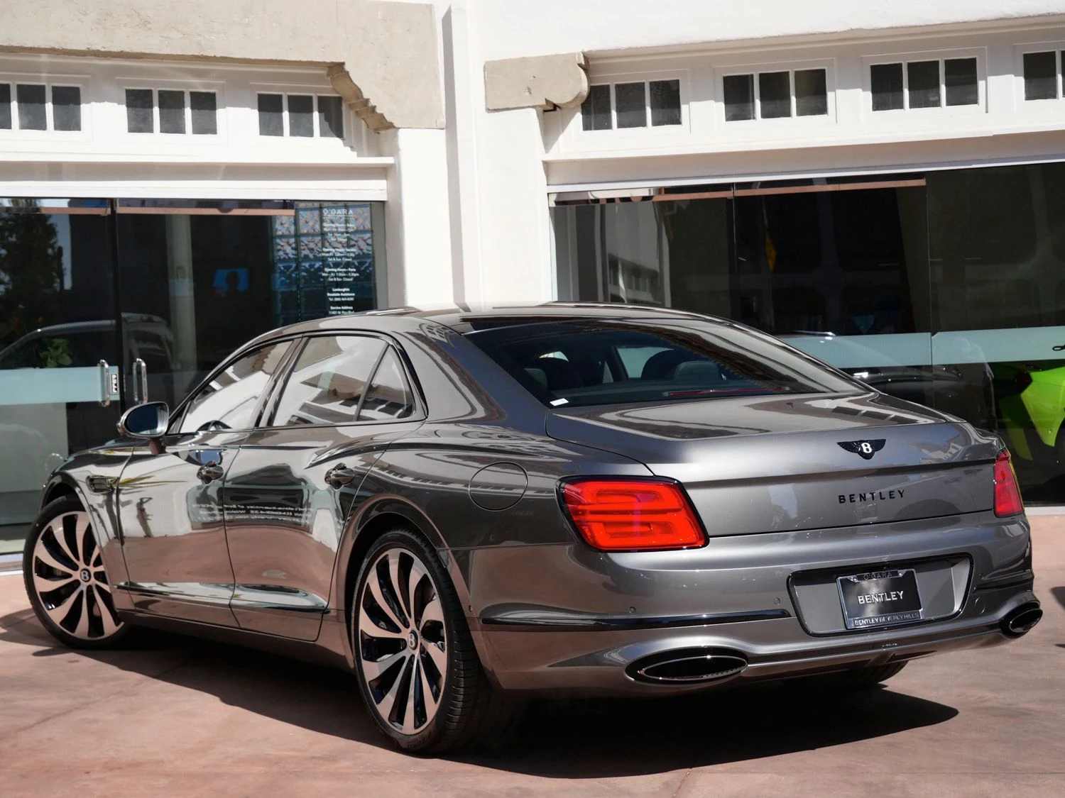 2026 Bentley Flying Spur, rear three-quarter view, Grey