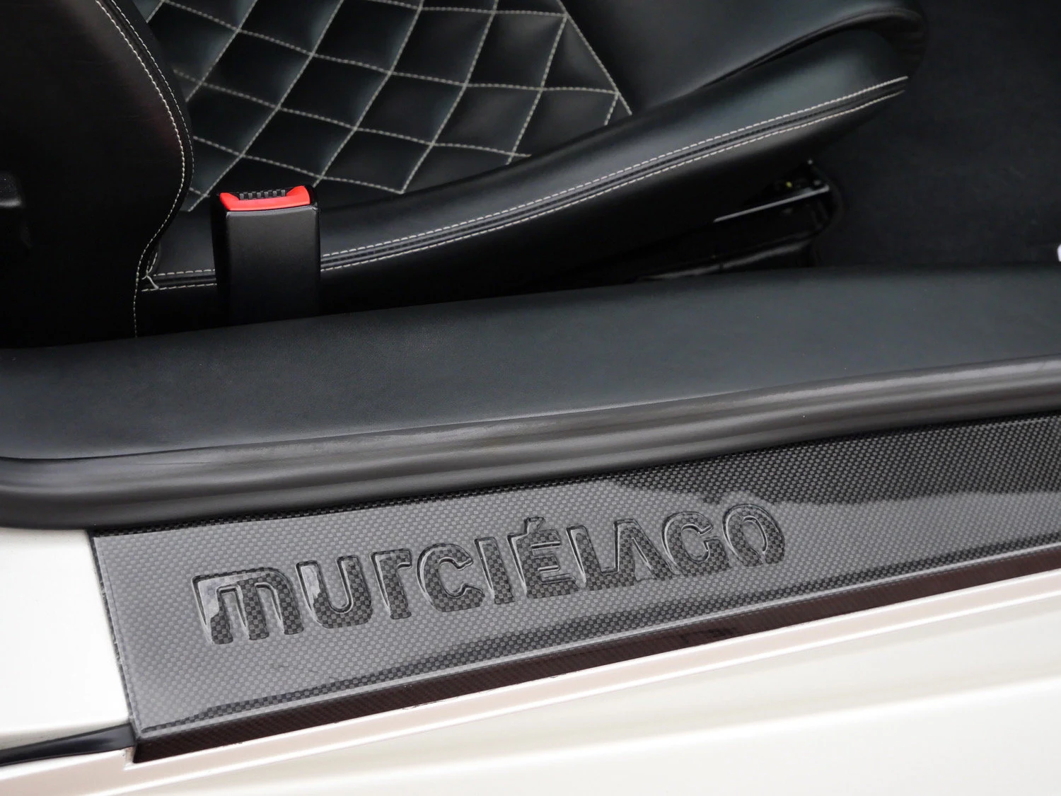 2009 Lamborghini Murciélago LP640 interior, door sill, Nero Perseus