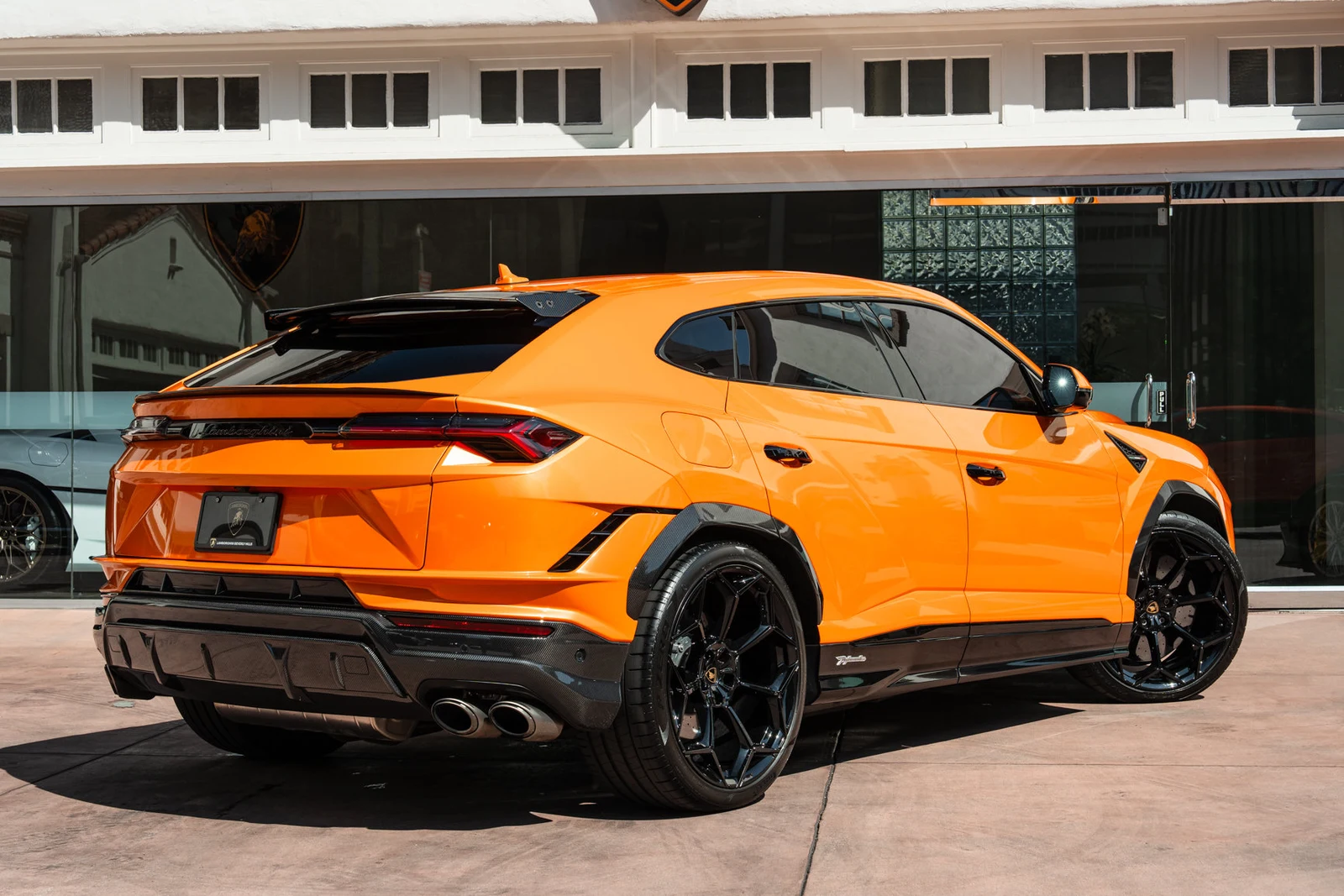 2024 Lamborghini Urus Performante, rear three-quarter view, Orange