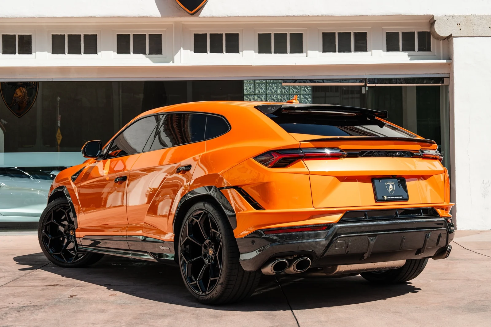 2024 Lamborghini Urus Performante, rear three-quarter view, Orange