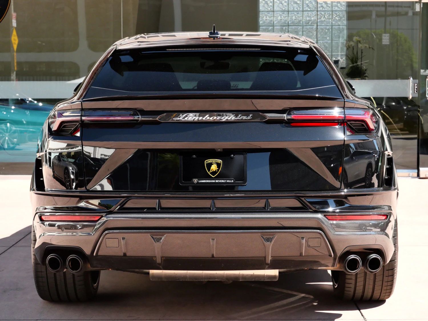 2024 Lamborghini Urus Performante, rear three-quarter view, Black