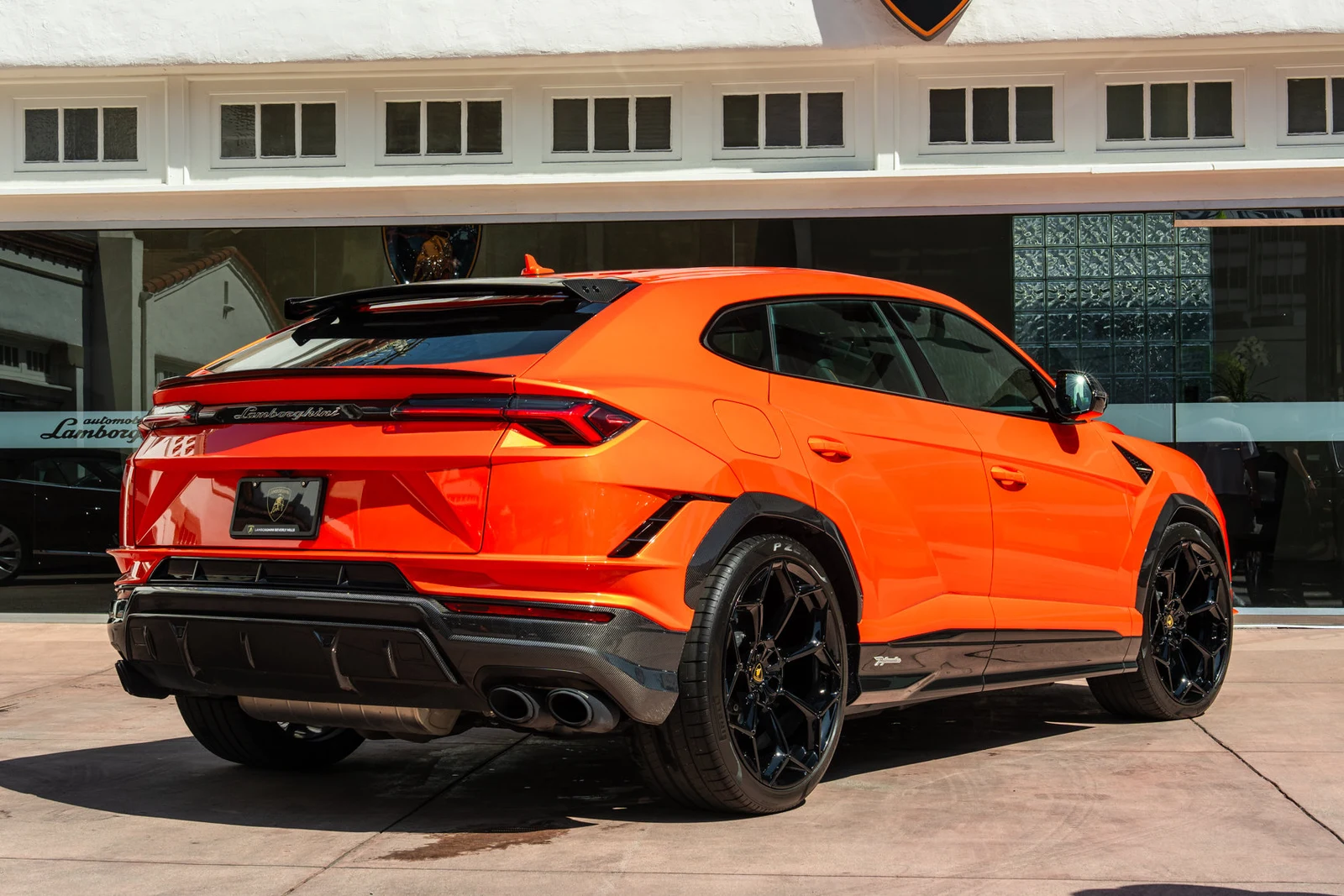 2024 Lamborghini Urus Performante, rear three-quarter view, Orange