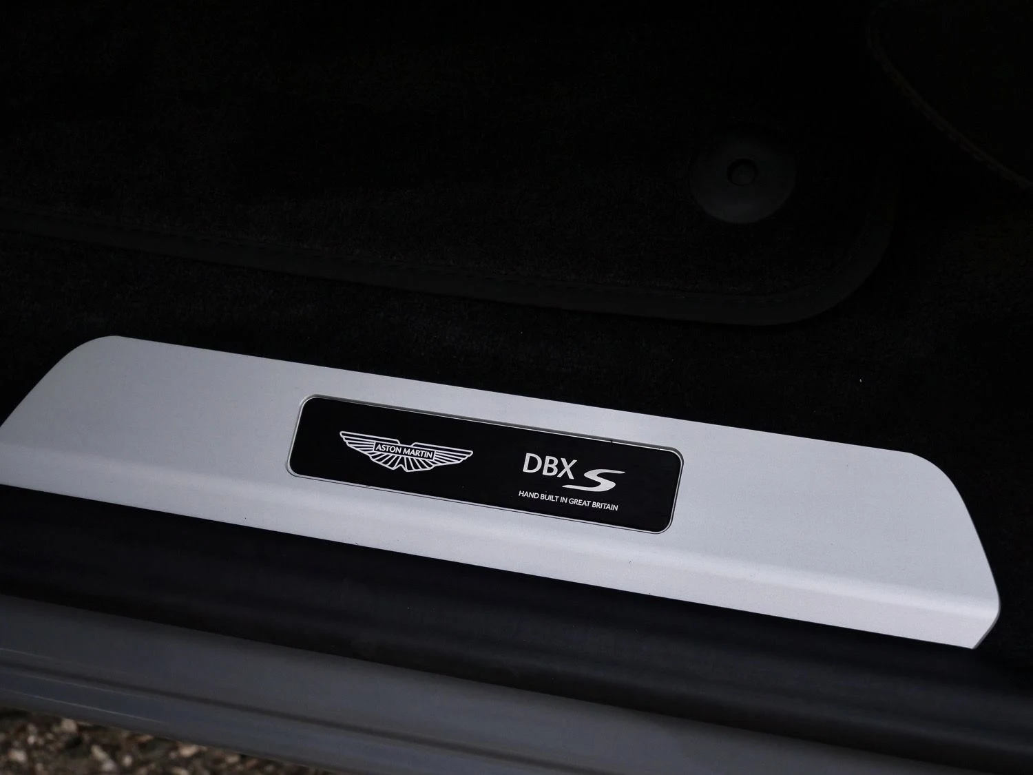 2026 Aston Martin DBX S interior, door sill, Onyx Black - Semi Aniline / On