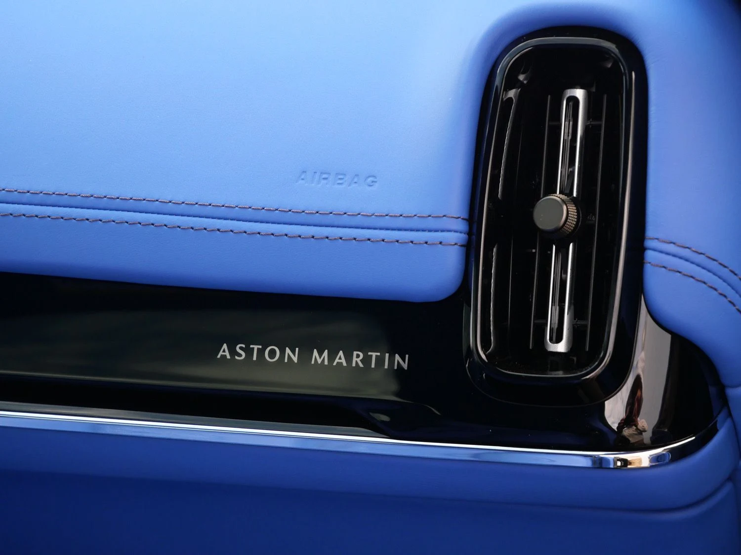 2026 Aston Martin DBX S interior, door sill, Cote D Azur Blue - Semi Aniline